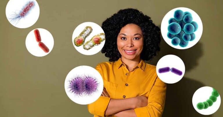 Person in a yellow shirt smiling with arms crossed, surrounded by various illustrated bacteria in circles against a green background.