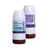 Two white inhalers are displayed with brown caps and labels indicating doses. One inhaler is labeled with a purple and white design, and the other with a green and white design.