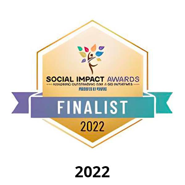 Trusted Messengers 17 Hexagonal badge with a colorful tree above the text "Social Impact Awards." A purple ribbon reads "Finalist" across the center. The number "2022" is below the ribbon.